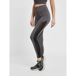 Damskie legginsy z wysoką talią Hummel hmlnorma. Szare legginsy Hummel, bez wzorów, sportowe. Za 204.00 zł.