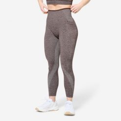Legginsy do treningu siłowego damskie Domyos seamless. Białe legginsy DOMYOS, bez wzorów, z elastanu, sportowe. Za 99.99 zł.
