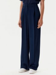 Tommy Hilfiger Spodnie materiałowe WW0WW46749 Granatowy Relaxed Fit. Niebieskie spodnie materiałowe Tommy Hilfiger, bez wzorów, z materiału. Za 649.99 zł.