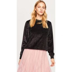 Bluza z błyszczącą nitką - Czarny. Bluzy marki DOMYOS. W wyprzedaży za 49.99 zł.