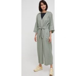 Dkny kombinezon lniany kolor zielony z dekoltem w szpic. Zielone kombinezony DKNY, l, bez wzorów, ze lnu, bez kołnierzyka, bez ramiączek. Za 849.99 zł.