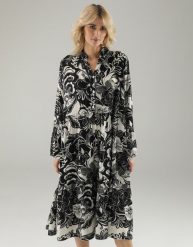 Czarna sukienka w kwiaty. Czarne sukienki Unisono, s, bez wzorów, z tkaniny, bez kołnierzyka, bez ramiączek, rozkloszowane. Za 189.00 zł.