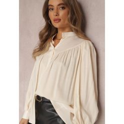 Beżowa Koszula z Bufiastym Rękawem Haidano. Brązowe koszule Renee, m, z aplikacjami, z tkaniny, eleganckie, bez kołnierzyka, bez ramiączek. W wyprzedaży za 111.99 zł.