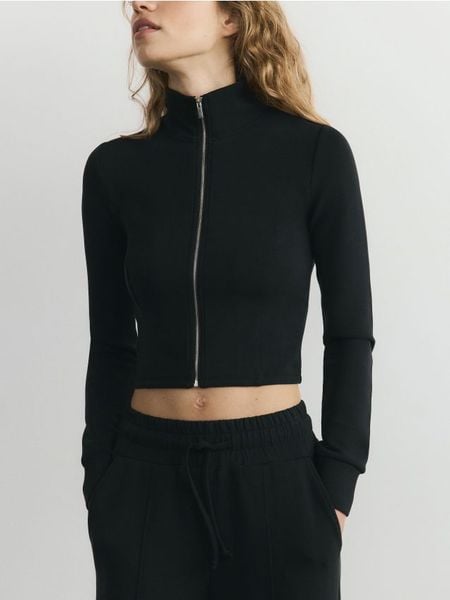 Rozpinana bluza z modalem - czarny. Czarne bluzy Reserved, l, bez wzorów, z dzianiny, bez kaptura. W wyprzedaży za 69.99 zł.