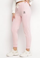 Różowe Bawełniane Spodnie z Gumką w Pasie z Troczkiem i Ściągaczami Pianca. Czerwone jeansy Born2be, bez wzorów, z bawełny, eleganckie. Za 79.99 zł.