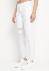 Białe Jeansy Skinny z Przetarciami i Dziurami Qloelini. Białe jeansy Born2be, bez wzorów, z jeansu. Za 99.99 zł.