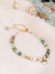 Pierres de Jade Pozłacana bransoletka z perłami i agatami rozmiar: onesize. Zielone bransoletki Pierres de Jade, z agatem, pozłacane. Za 56.99 zł.