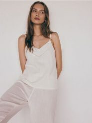 Dwuczęściowa piżama - złamana biel. Piżamy Reserved, l, bez wzorów, z bawełny, bez kołnierzyka, bez ramiączek, długie. W wyprzedaży za 69.99 zł.