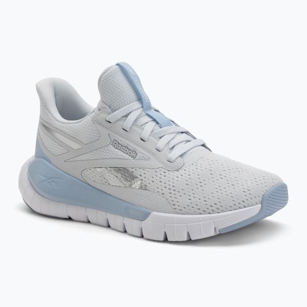 Buty Reebok Reebok Flex Trainer moon/Y2K. Białe buty treningowe REEBOK FITNESS, bez wzorów, bez zapięcia, na fitness i siłownię. Za 329.99 zł.