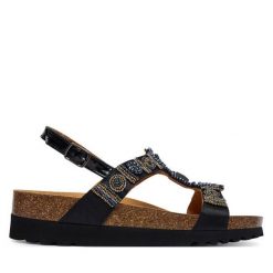 Sandały Scholl. Czarne sandały Scholl, bez wzorów, bez obcasa, na płaskiej podeszwie, bez zapięcia. Za 339.99 zł.