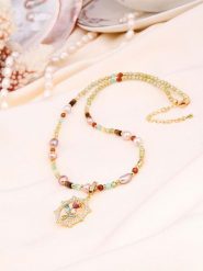 L'Atelier de Gaia Pozłacany naszyjnik z elementami ozdobnymi - dł. 50 cm rozmiar: onesize. Czerwone naszyjniki L'Atelier de Gaia, z materiału, z cyrkonią, pozłacane. Za 86.99 zł.