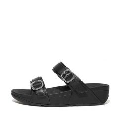 Kobiece klapki na koturnie FitFlop Lulu. Czarne klapki FIT FLOP, bez wzorów, z materiału, eleganckie, bez obcasa, na koturnie, bez zapięcia. Za 534.50 zł.