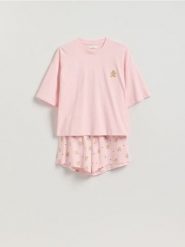 Świąteczna piżama dwuczęściowa - pastelowy róż. Czerwone piżamy Reserved, l, bez wzorów, z bawełny, bez kołnierzyka, bez ramiączek. Za 59.99 zł.