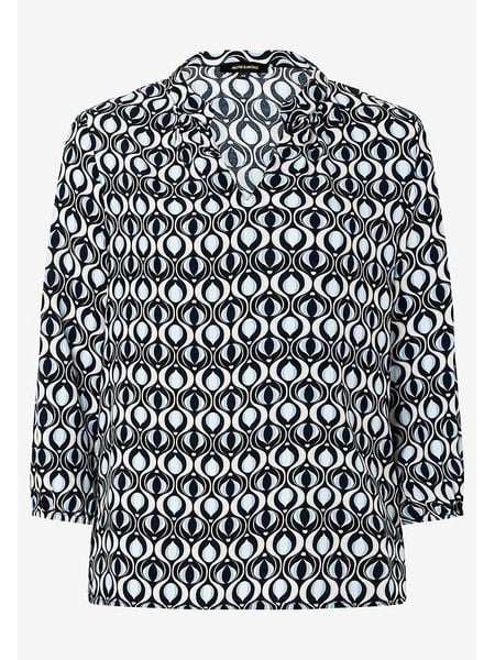 More & More Bluzka w kolorze błękitno-granatowo-białym rozmiar: 44. Białe bluzki More & More, s, bez wzorów, z wiskozy, klasyczne, bez kołnierzyka, bez ramiączek. Za 96.14 zł.