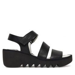 Sandały Fly London. Czarne sandały Fly London, bez wzorów, bez obcasa, na koturnie, bez zapięcia. Za 547.99 zł.