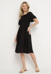 Czarna Rozkloszowana Sukienka Bawełniana z Bufiastymi Rękawami i Elastyczną Górą Veliova. Czarne sukienki Born2be, na co dzień, l, bez wzorów, z bawełny, eleganckie, bez kołnierzyka, bez ramiączek, midi, rozkloszowane. Za 49.99 zł.