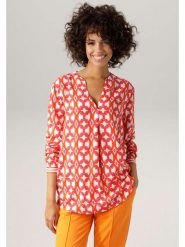 Aniston Bluzka w kolorze pomarańczowo-różowym rozmiar: 38. Pomarańczowe bluzki Aniston, bez wzorów, z wiskozy, bez kołnierzyka, bez ramiączek. Za 95.99 zł.
