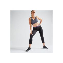 Legginsy 7/8 fitness kardio damskie 100 czarne. Czarne legginsy DOMYOS, bez wzorów, z elastanu. Za 49.99 zł.