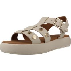 Sandały GEOX D CAMALEI Beżowy. Brązowe sandały Geox, bez wzorów, z materiału, klasyczne, bez obcasa, bez zapięcia. Za 323.99 zł.