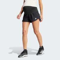 Szorty Pacer Woven Stretch Training Maternity. Białe szorty sportowe adidas, bez wzorów, z dzianiny, z standardowym stanem, na fitness i siłownię. Za 199.00 zł.