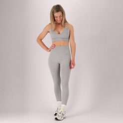 Damski zestaw sportowy - Legginsy/stanik - Szary. Szare legginsy XTREME, bez wzorów, z dresówki, sportowe. Za 207.04 zł.