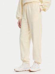 Reebok Spodnie dresowe RK25529CCW Żółty Regular Fit. Żółte spodnie dresowe Reebok, bez wzorów, z dresówki. Za 199.99 zł.