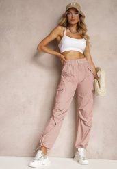 Różowe Spodnie High Waist o Fasonie Bojówek ze Ściągaczem w Pasie Elola. Czerwone jeansy Renee, l, bez wzorów, z bawełny, klasyczne, z podwyższonym stanem, długie. W wyprzedaży za 29.99 zł.
