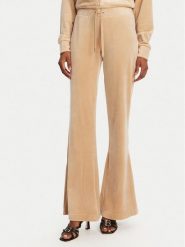 Juicy Couture Spodnie dresowe Christine JCWBJ125304 Beżowy Flared Leg. Brązowe spodnie dresowe Juicy Couture, bez wzorów, z dresówki. Za 239.99 zł.