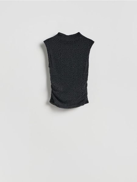 Bluzka z metalizowaną nicią - czarny. Czarne bluzki Reserved, l, bez wzorów, z dzianiny, bez kołnierzyka, bez ramiączek. Za 99.99 zł.