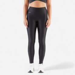 Legginsy do biegania damskie Kiprun Run 100. Czarne legginsy KALENJI, bez wzorów, z elastanu, sportowe. Za 59.99 zł.