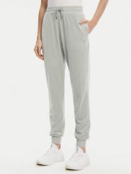 Guess Spodnie dresowe V3BB27 K0232 Zielony Regular Fit. Zielone spodnie dresowe Guess, z aplikacjami, z dresówki. Za 329.99 zł.