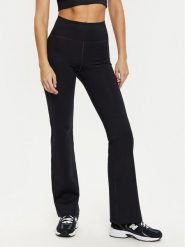 Girlfriend Collective Legginsy Compressive 4038 Czarny Flare Fit. Czarne legginsy GIRLFRIEND COLLECTIVE, bez wzorów, z syntetyku, sportowe. Za 249.99 zł.