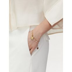 Bransoletka Guess. Żółte bransoletki Guess, złote. Za 179.99 zł.