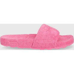 Juicy Couture klapki damskie kolor różowy. Czerwone klapki Juicy Couture, bez wzorów, z gumy, bez obcasa, na płaskiej podeszwie, bez zapięcia. Za 229.99 zł.