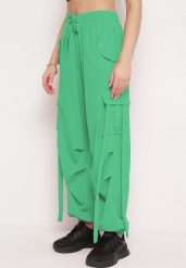 Zielone Spodnie Bojówki o Luźnym Kroju ze Sznurkami po Bokach Tizelle. Zielone jeansy Born2be, l, bez wzorów, z jeansu, eleganckie, długie. W wyprzedaży za 33.99 zł.