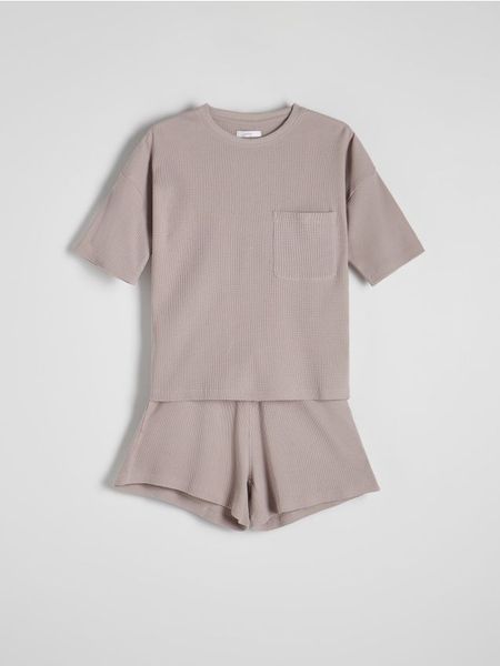 Dwuczęściowa piżama - jasnoszary. Szare piżamy Reserved, l, bez wzorów, z bawełny, bez kołnierzyka, bez ramiączek. W wyprzedaży za 69.99 zł.