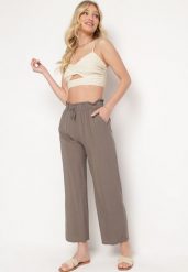 Brązowe Spodnie Sharrill. Brązowe jeansy Born2be, l, z aplikacjami, z jeansu, eleganckie, długie. W wyprzedaży za 38.24 zł.