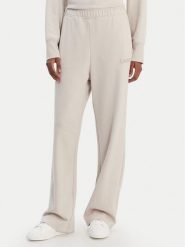 DKNY Sport Spodnie dresowe DP6P3795 Beżowy Regular Fit. Brązowe spodnie dresowe DKNY Sport, bez wzorów, z bawełny. Za 309.99 zł.