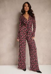 Bordowy Kopertowy Kombinezon z Wiskozą z Szerokimi Nogawkami i Paskiem w Geometryczny Wzór Botavia. Czerwone sukienki Renee, na co dzień, l, bez wzorów, z materiału, eleganckie, bez kołnierzyka, bez ramiączek, kopertowe. W wyprzedaży za 119.99 zł.