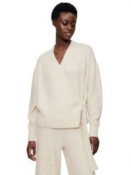 Triumph Kardigan "Amourette" w kolorze beżowym rozmiar: 44. Brązowe swetry Triumph, bez wzorów, ze splotem, bez ramiączek. Za 119.40 zł.