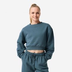 Bluza fitness damska Domyos crop. Niebieskie bluzy z kapturem DOMYOS, l, bez wzorów, z bawełny, bez kaptura, na fitness i siłownię. Za 129.99 zł.