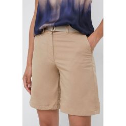 Tommy Hilfiger szorty damskie kolor beżowy gładkie high waist. Brązowe szorty Tommy Hilfiger, bez wzorów, z bawełny. W wyprzedaży za 369.99 zł.