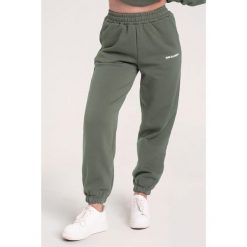 Spodnie fitness damskie Gym Glamour dresowe. Zielone spodnie dresowe GYM GLAMOUR, bez wzorów, z dresówki, na fitness i siłownię. Za 189.99 zł.