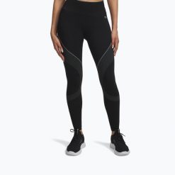 Legginsy Under Armour HeatGear. Czarne legginsy Under Armour, bez wzorów, sportowe. Za 239.99 zł.