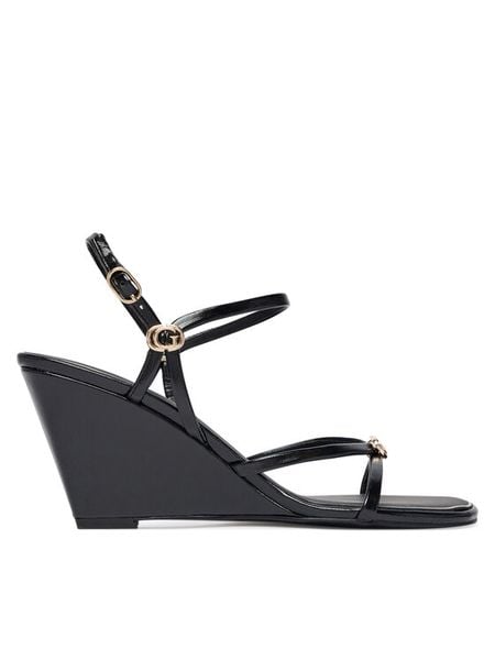 Guess Sandały FLTDVV PAF04 Czarny. Czarne sandały Guess, z aplikacjami, ze skóry, bez obcasa, na koturnie, bez zapięcia. Za 494.99 zł.