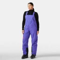 Damski kombinezon narciarski Helly Hansen Emiko Shell Bib. Fioletowe kombinezony Helly Hansen, na zimę, bez wzorów, sportowe, bez kołnierzyka, bez ramiączek. W wyprzedaży za 958.00 zł.