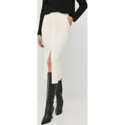 Twinset spódnica kolor beżowy midi ołówkowa. Brązowe spódnice Twinset, m, bez wzorów, midi, ołówkowe. W wyprzedaży za 379.99 zł.