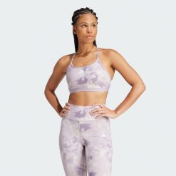 Biustonosz Aeroreact Training Essentials Light Support Tie-Dye Flower-Print. Czerwone biustonosze sportowe adidas, bez wzorów, z materiału, na fitness i siłownię. Za 179.00 zł.