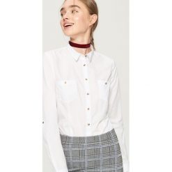 Klasyczna koszula - Biały. Koszule marki QUECHUA. W wyprzedaży za 19.99 zł.
