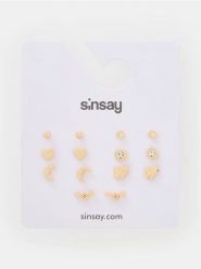 Kolczyki 7 pack - złoty. Żółte kolczyki Sinsay, złote. Za 9.99 zł.